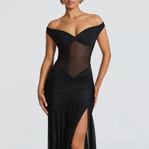 Detail of ruched mesh panels and side slit on this black strapless evening maxi dress