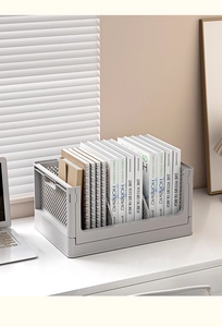Close-up of light grey foldable plastic storage basket for desk organization