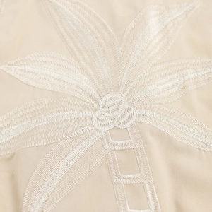 Robe bohème col en V avec broderie palmier et finition en tissu beige texturé