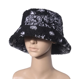 Winter faux lamb wool bucket hat with black and white textured paisley pattern