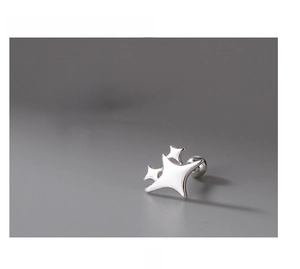 Close-up of minimalist S999 sterling silver star stud earrings with screw-back design