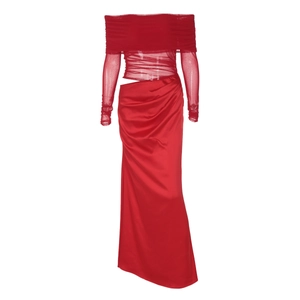 Detail of red off-shoulder mesh bodice and high-slit satin skirt with elegant draping