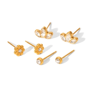 Three pairs of gold-plated stainless steel stud earrings with floral and crystal designs