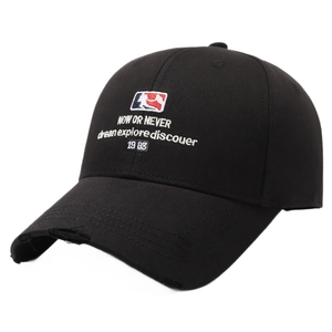 Distressed black baseball cap with letter embroidery and sport logo on white background