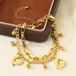 Double-layer gold stainless steel heart pendant bracelet on a luxury gift box