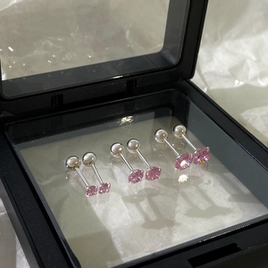 Detailed comparison of three sizes of pink zircon magnetic clip-on earrings in a black box