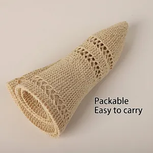 Foldable beige knitted straw sun hat for women with hollow out pattern for summer travel