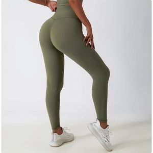 Rear view of olive green high waist yoga pants showing compression and butt lifting fit