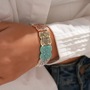 Vintage oval embossed multi-color bracelet with floral metal link patterns on model