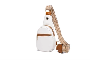 Detail of white leather crossbody chest bag with geometric strap and gold hardware