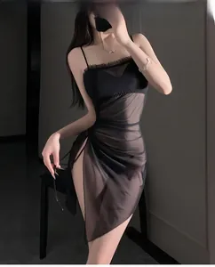 Detailed view of sexy black lace nightdress with high slit and mesh panels