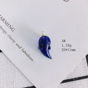 Macro shot of 25x11mm dark blue transparent ghost pendant for DIY Halloween jewelry