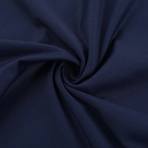 Macro shot of navy blue knitted fabric texture with a premium glossy finish and elasticity