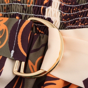 Ethnic print maxi dress with elastic waist and beige belt featuring gold D-ring buckle