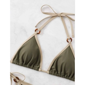 Olive green triangle bikini top with cream trim and tortoiseshell ring accents