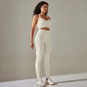 Detailed side view of seamless cream yoga set showing ribbing and high waist compression