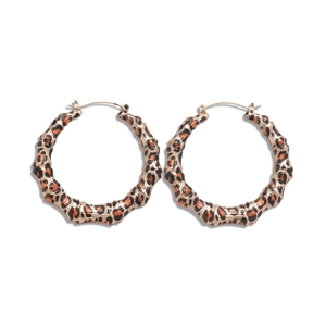 Boucles d'oreilles créoles dorées motif léopard et design bambou style rétro