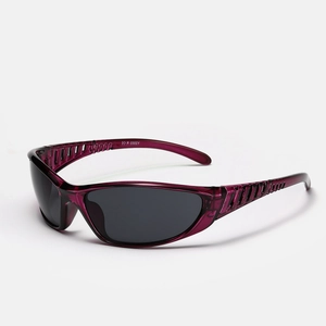 Detail view of purple semi-transparent sports sunglasses with side ventilation grids