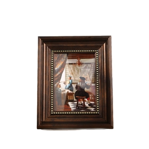 Vintage French wooden photo frame with gold studs and classical oil painting portrait