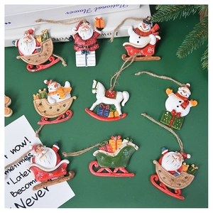 Detailed view of a 9-piece set of Nordic vintage Christmas tree ornaments with sleds and snowmen