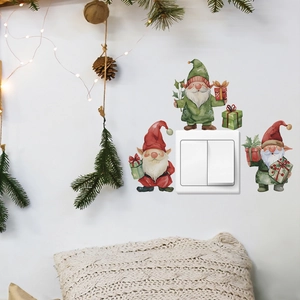 Close-up of three watercolor Christmas gnome stickers for home light switch decoration