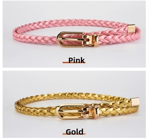Detail of pink and gold braided PU belts featuring polished gold U-shaped buckles