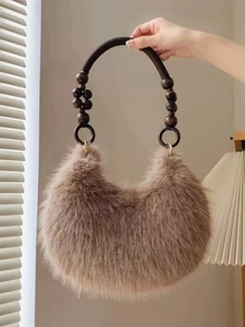 Vintage khaki faux fur hobo bag with unique wooden beaded handles for winter fashion