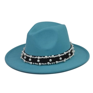 Detail of lake blue wool felt fedora with black decorative band and white pearl accents