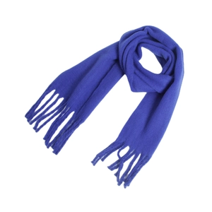 Close-up of soft blue mohair scarf featuring textured knit and long tassel fringe details