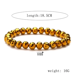 Detailed view of 8mm faceted golden crystal beads with 18.5cm stretch bracelet length