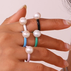 Five-piece stainless steel open ring set with colorful enamel and pearl accents
