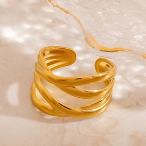 Minimalist gold multi-layer leaf ring with adjustable open band on marble texture