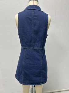 Detailed back view of a dark blue denim V-neck sleeveless dress on a mannequin