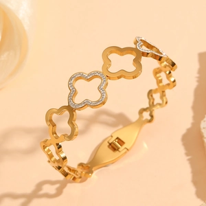 18K gold plated hollow four-leaf clover bangle with sparkling diamonds for women