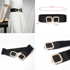 Detail view of a 6cm wide black elastic belt featuring dual pearl buckle design with size data