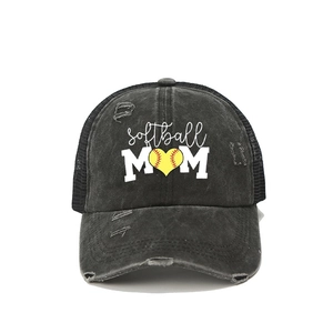 Distressed black SOFTBALL MOM trucker hat with heart softball print and mesh back