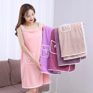 Detail of coral fleece wearable bath towels in pink, purple, wine red and brown