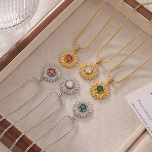 Exquisite sunflower necklaces with colorful gems in gold and silver finish on wood
