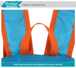 Detail of high-density orange webbing handle and mesh texture on blue sports backpack