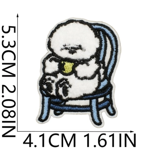 Detailed view of Bichon dog embroidery patch with size measurements 5.3cm by 4.1cm