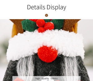 Close-up of high quality fabrics, reindeer antlers and felt texture on Christmas gnome