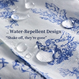 Water repellent French floral cotton apron with blue toile de jouy pattern detail