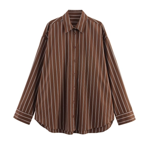 Detailed flat lay of brown striped long sleeve shirt with crisp collar and button closure