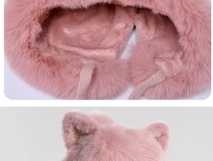 Detail of pink cat-ear hat showing plush velvet lining and sparkly sequin accents