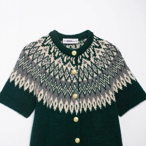 Short sleeve green knit cardigan with jacquard pattern and gold buttons flat lay