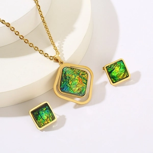 Golden square jewelry set with green resin pendants including necklace and stud earrings