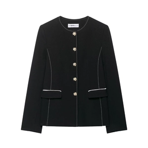 Women's chic black blazer and skort set with white contrast trim and gold buttons