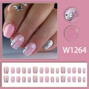 Pink and silver glitter press-on nails with white star patterns in 24-piece set