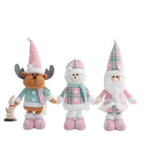 Pink and mint green plush Christmas dolls set featuring Santa, snowman, and reindeer