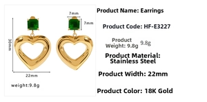 Detail view of gold heart earrings with square green zircon studs and 18K plating